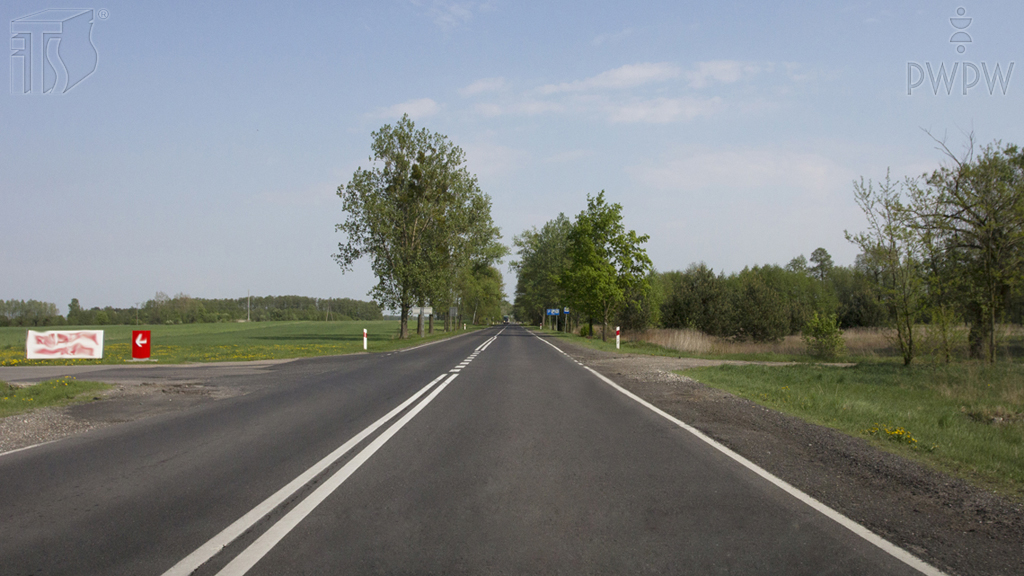 Pytanie Q-0420: Czy z tak oznakowanej jezdni wolno Ci zjechać na widoczny po lewej stronie parking?